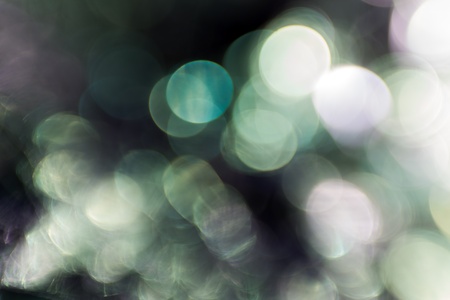 Photo of bokeh lights on black backgroundの写真素材