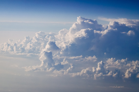 dramatic blue sky with clouds and sun raysの写真素材