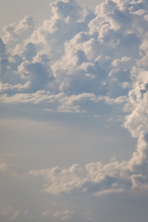 dramatic blue sky with clouds and sun raysの写真素材