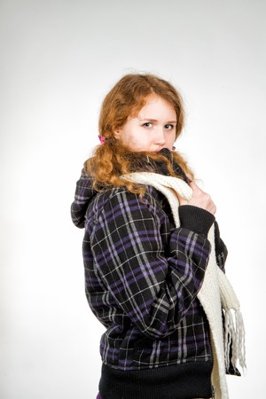 beautiful woman dressed in winter clothes smiling - studio shotsの写真素材