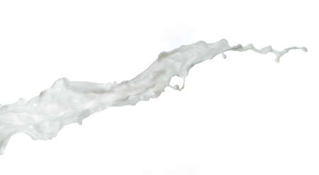 pouring milk or white liquid created splashの写真素材