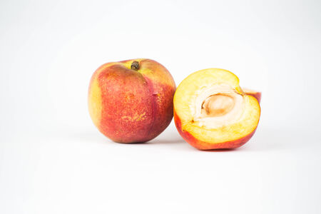 Nectarine fruit isolated on white cutoutの写真素材