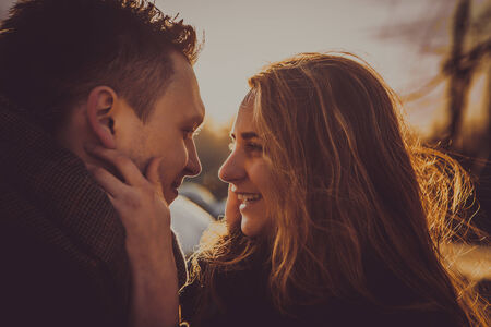 Happy Young Couple in Winter Park having fun.の写真素材