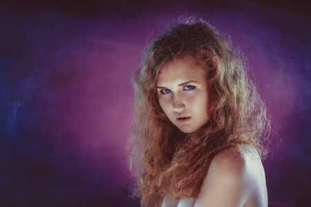 Studio portrait of young beautiful womanの写真素材