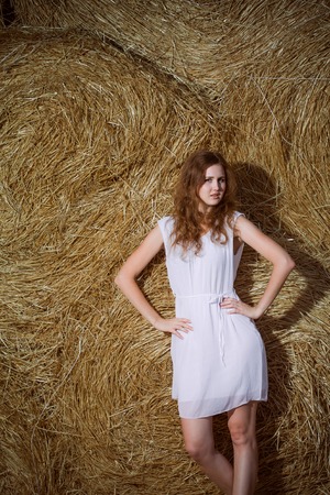 Romantic young woman posing  outdoor.の写真素材
