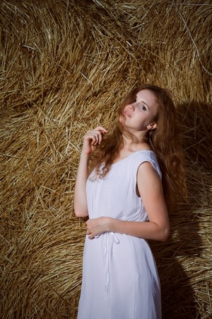 Romantic young woman posing  outdoor.の写真素材