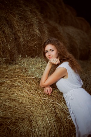 Romantic young woman posing  outdoor.の写真素材