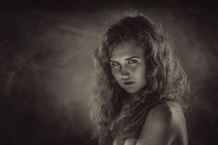 Studio portrait of young beautiful womanの写真素材