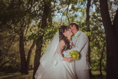Married Couple in forest  embracingの写真素材