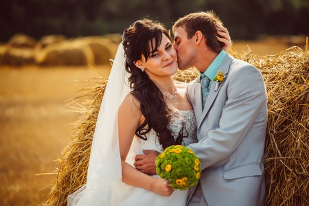 Beautiful bride and groom portrait in  natureの写真素材