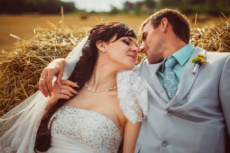 Beautiful bride and groom portrait in  natureの写真素材