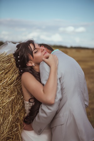 Beautiful bride and groom portrait in  natureの写真素材