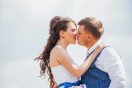 bride and groom near hay barnの写真素材