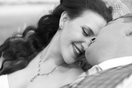 bride and groom near hay barnの写真素材