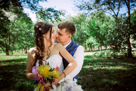 Married Couple in forest  embracingの写真素材