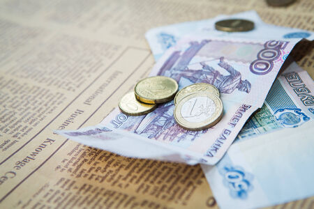 russian roubles banknotes and  euro and dollars coins
