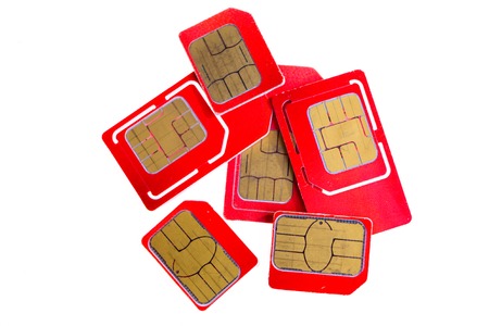 Stack of red sim card on white  background