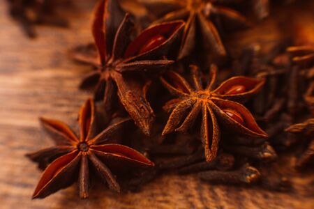 Cinnamon sticks with anise star  on wooden backgroundの写真素材