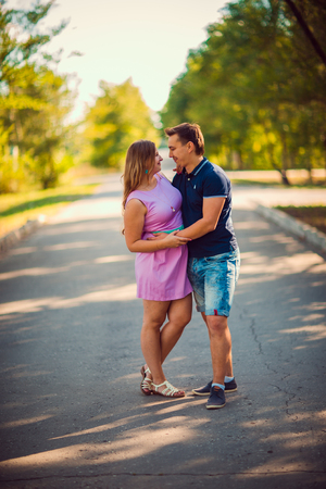 Romantic young couple  laugh on background summer forestの写真素材