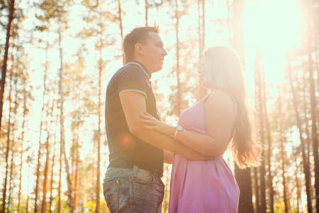Romantic young couple  laugh on background summer forestの写真素材
