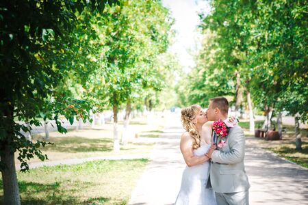 beautiful young couple stand on  background forestの写真素材