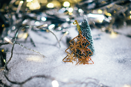 miniature Christmas tree in the snow and  decorationsの写真素材