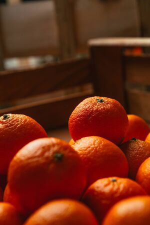 Fresh fruit  tangerines in a wooden boxの写真素材