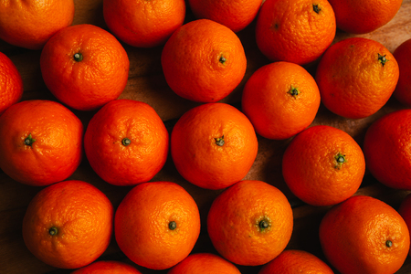 many beautiful fresh orange  tangerines close upの写真素材