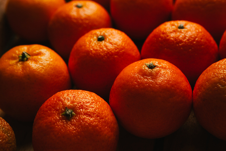 many beautiful fresh orange  tangerines close upの写真素材