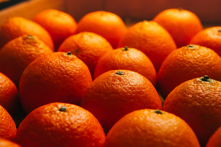 many beautiful fresh orange  tangerines close upの写真素材