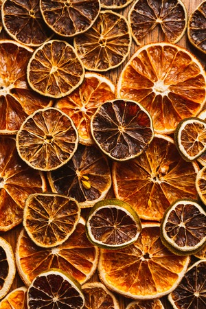 background of rings of dried orange and  lemonの写真素材
