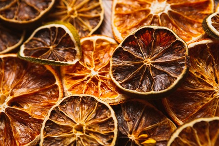background of rings of dried orange and  lemonの写真素材