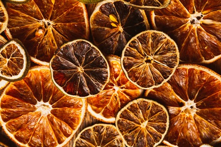 background of rings of dried orange and  lemonの写真素材