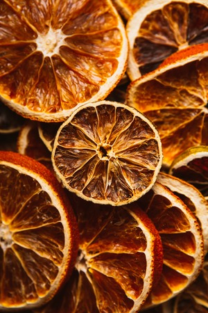 background of rings of dried orange and  lemonの写真素材