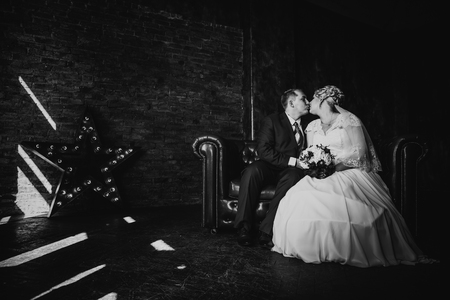 Black white  photography  beautiful young  couple suit on a dark backgroundの写真素材