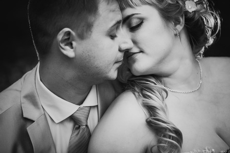 Black white  photography beautiful wedding young couple stand on  background forestの写真素材