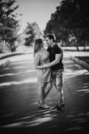 Black white photography  romantic young couple  laugh on background summer forestの写真素材