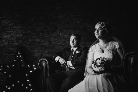Black white  photography  beautiful young  couple suit on a dark backgroundの写真素材