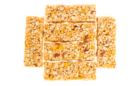 muesli bars with  dried fruit on isolated  backgroundの写真素材