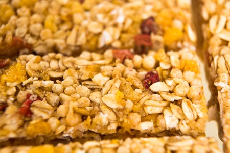 muesli bars with  dried fruit on isolated  background