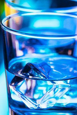 Two glasses of vodka with ice closeup.の写真素材