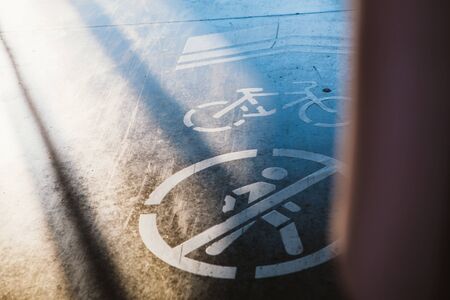sign cyclist and pedestrian ban on the background of asphalt road.の写真素材