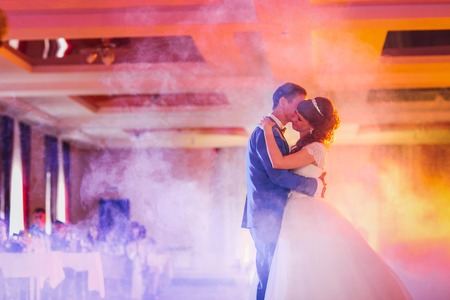 first dance the bride and groom in the smoke.の写真素材