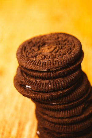 stack of cookies on dark blurred  backgroundの写真素材
