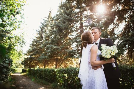 Couple bride and groom on a park.の写真素材