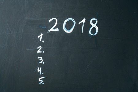 inscription 2018 do it list drawn with chalk on a school blackboard darkの写真素材
