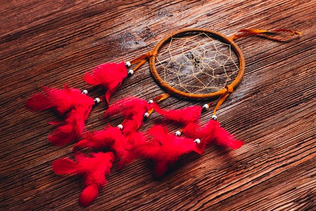 Dreamcatcher on the dark wooden backgroundの写真素材