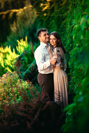 Beautiful young couple on a nature backgroundの写真素材