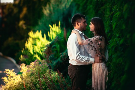 Beautiful young couple on a nature backgroundの写真素材