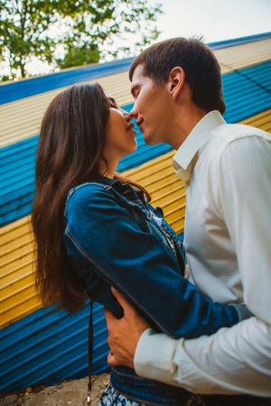 Beautiful young couple on the city backgroundの写真素材